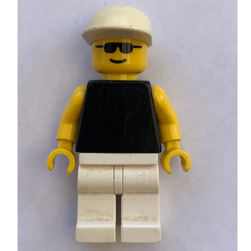 Man, Black Torso with Yellow Arms, White Legs… — minifigurine LEGO | Brick Broker