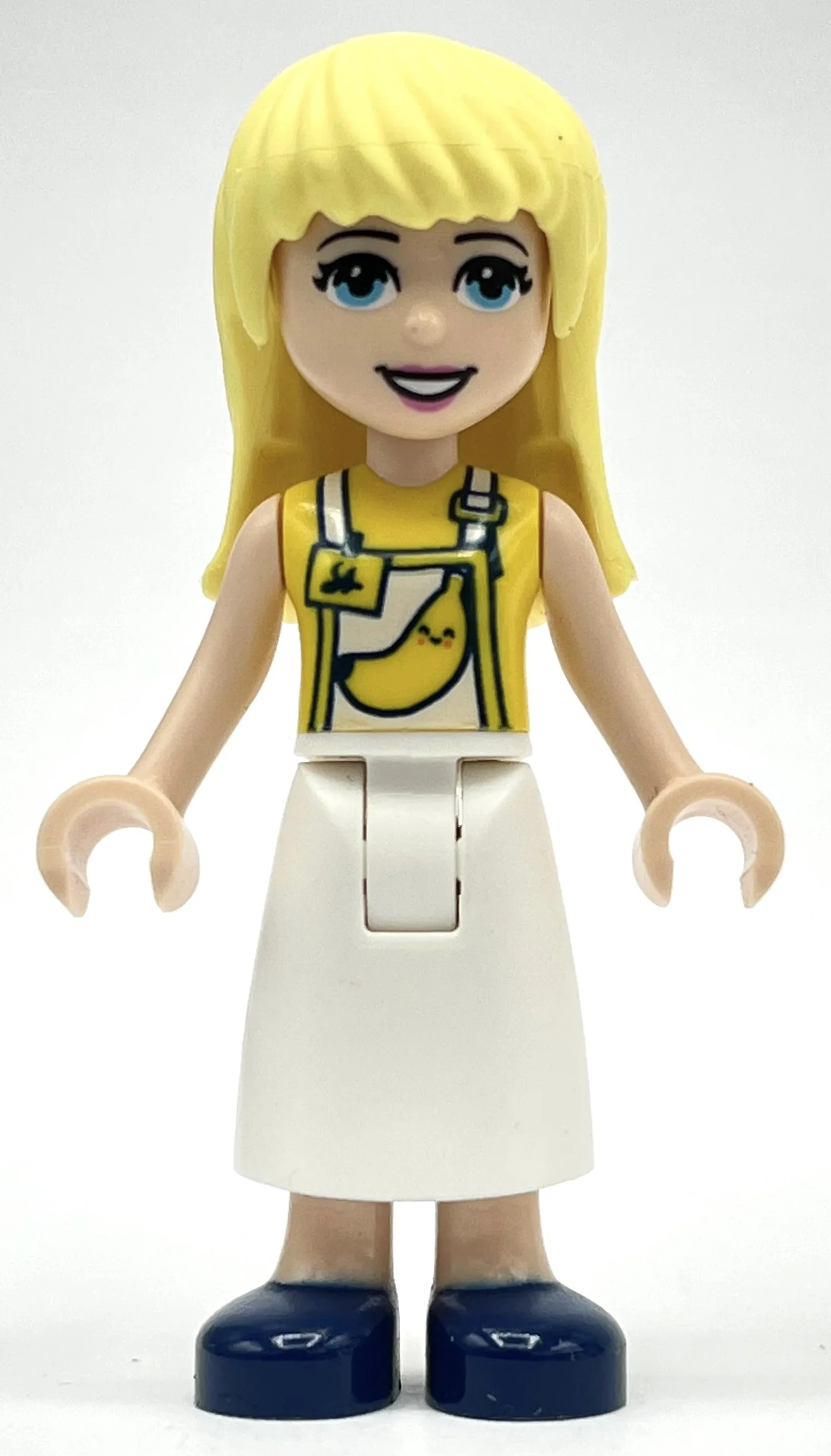 Stephanie - Yellow Top, White Apron — dans quels sets LEGO ? (fig-002701) | Brick Broker