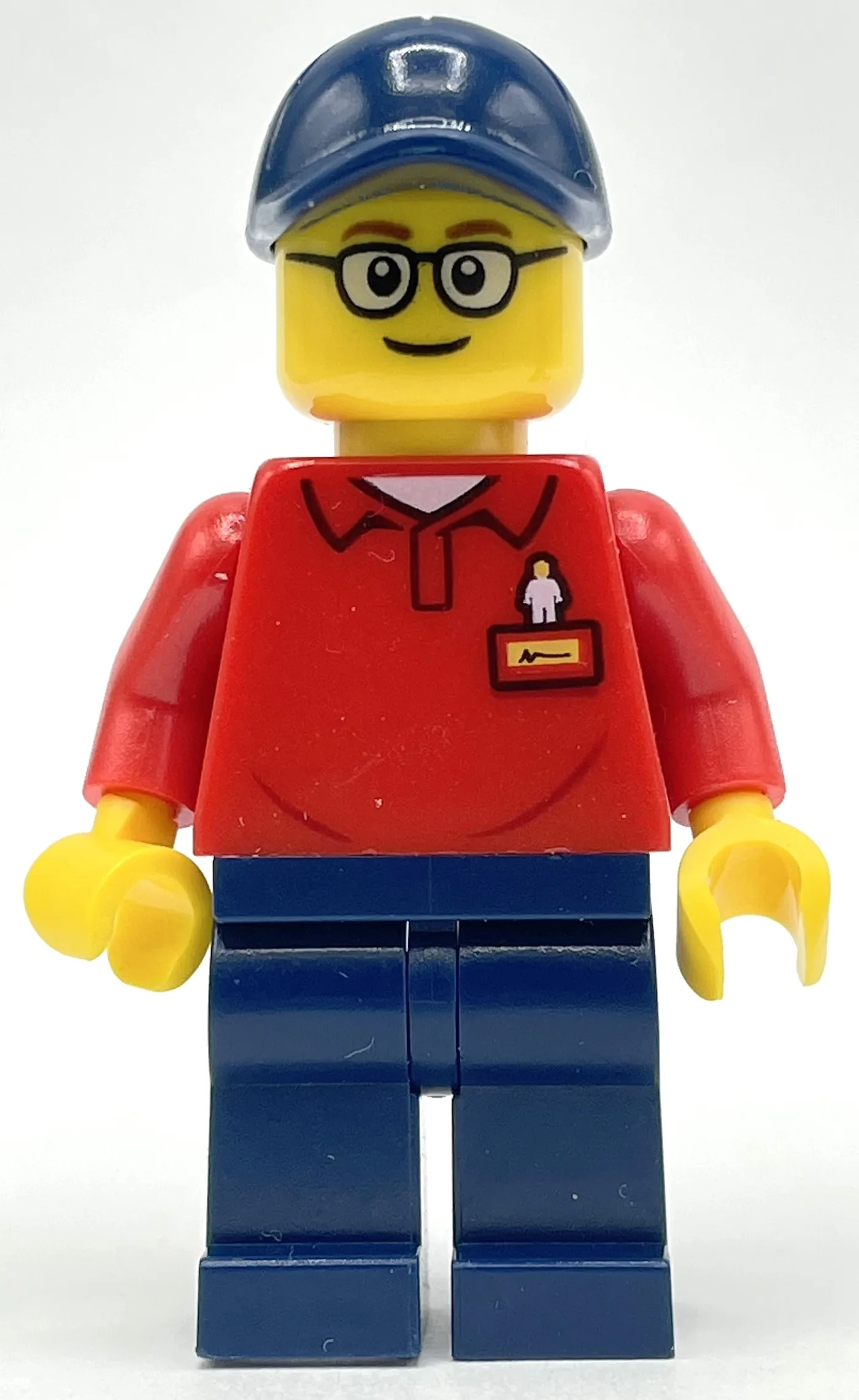 LEGOLAND Employee, Red Torso, Dark Blue Legs,… — minifigurine LEGO | Brick Broker