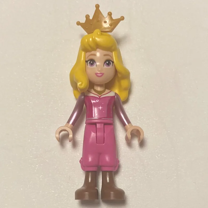 Aurora - Dark Pink Trousers, Big Eyes, Yellow… — minifigurine LEGO | Brick Broker