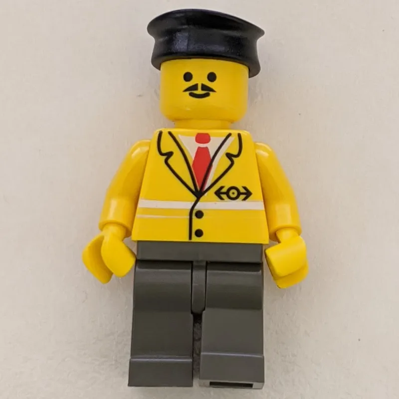 Conductor - Yellow Jacket, Dark gray Legs, Bl… — minifigurine LEGO | Brick Broker