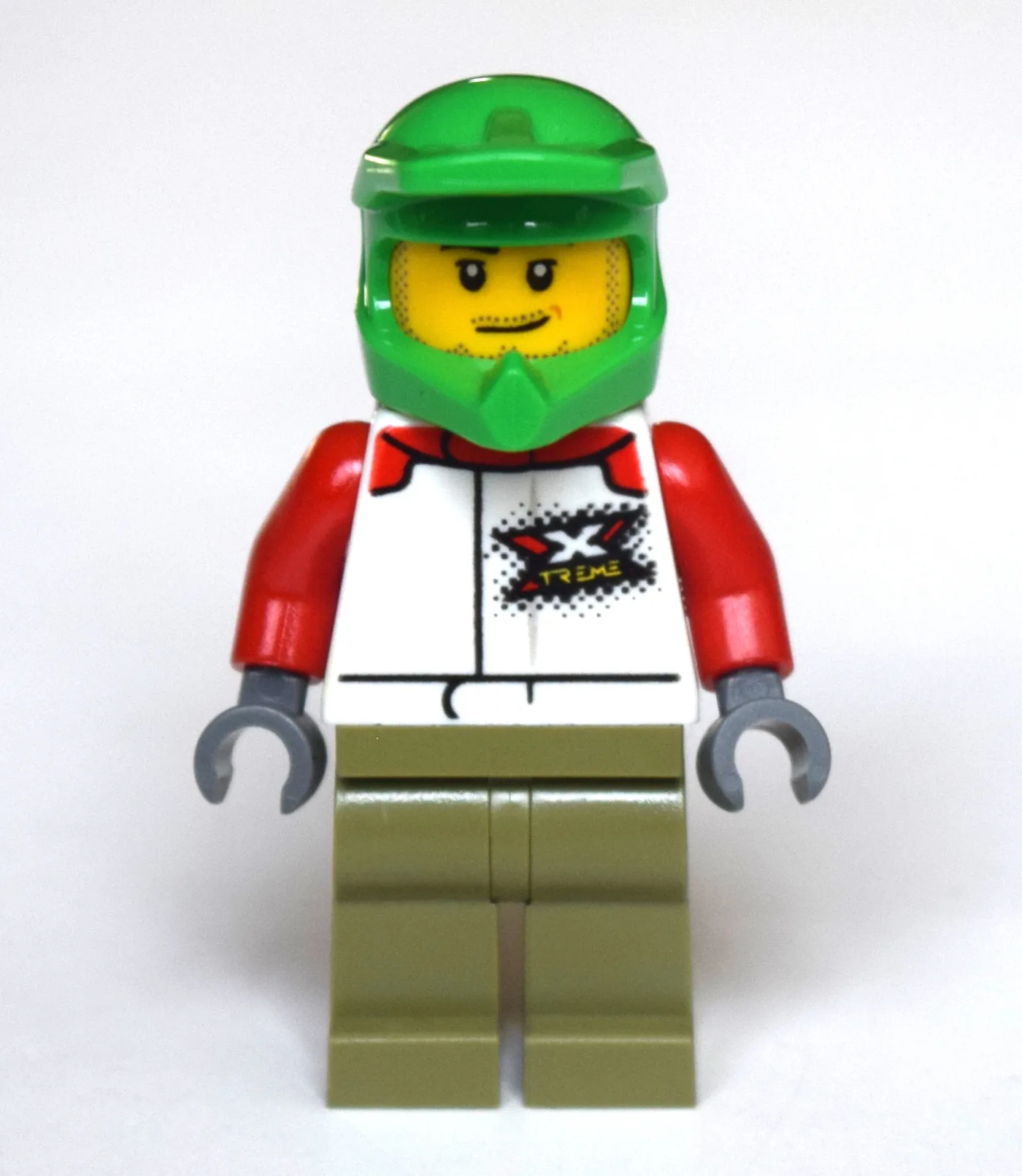 Man, White Racing Jacket, Olive Green Legs, G… — minifigurine LEGO | Brick Broker