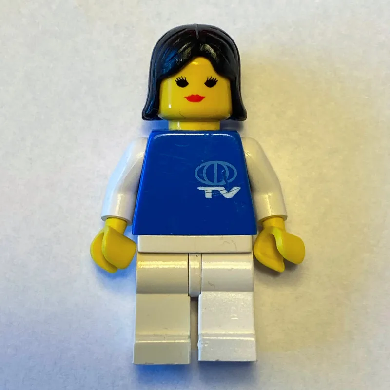 Woman, Blue Top with TV Logo, White Legs, Bla… — minifigurine LEGO | Brick Broker