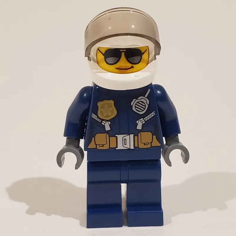 Policewoman, Dark Blue Jacket with Radio, Bad… — minifigurine LEGO | Brick Broker