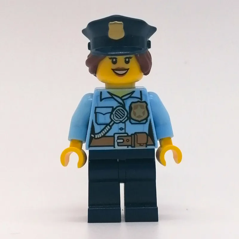 Policewoman, Bright Light Blue Shirt with Rad… — minifigurine LEGO | Brick Broker