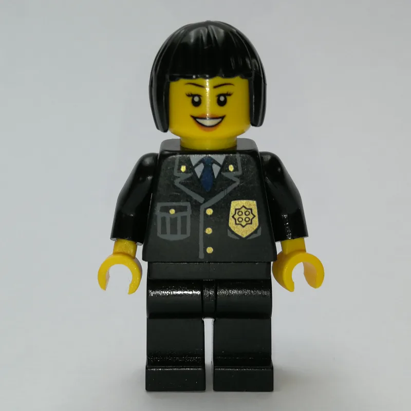 Policewoman, Black Suit with Badge, Black Hair — minifigurine LEGO | Brick Broker