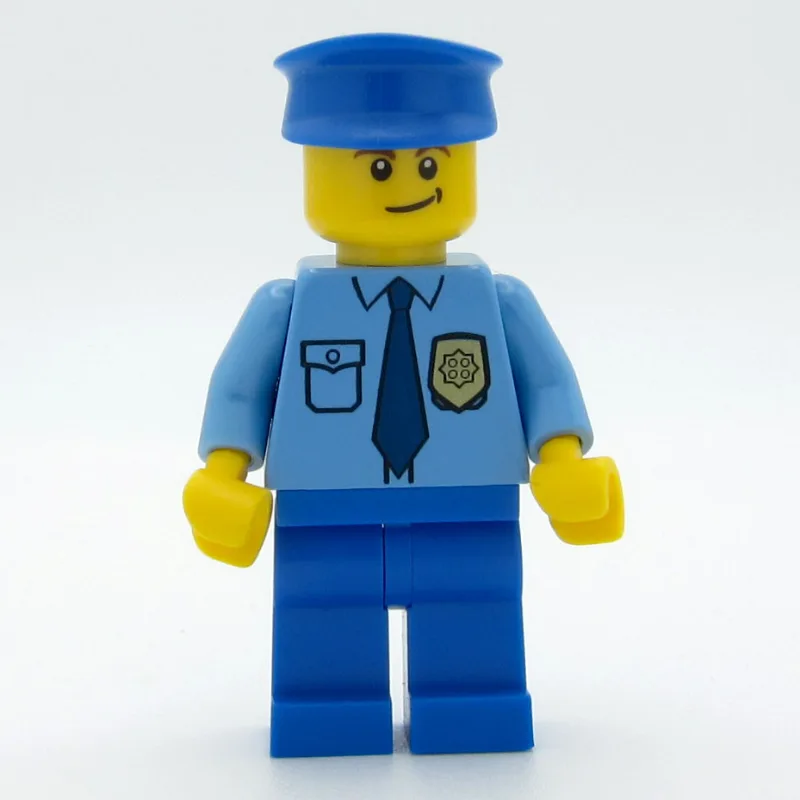 Policeman, Medium Blue Shirt with Badge and T… — minifigurine LEGO | Brick Broker