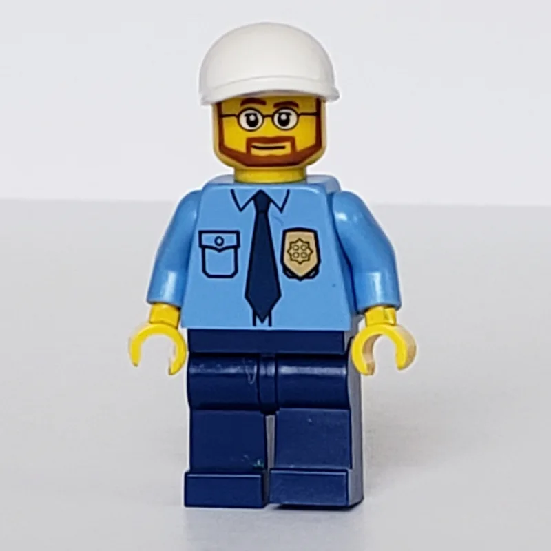 Policeman, Medium Blue Shirt with Badge and T… — minifigurine LEGO | Brick Broker