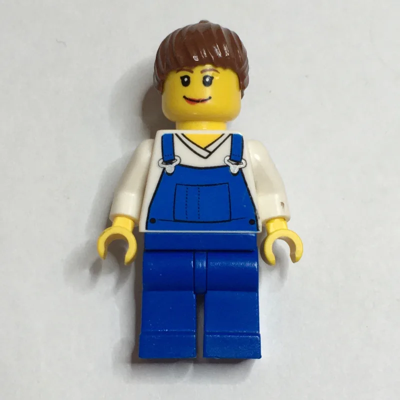 Woman, Blue Overalls over White V-Neck Shirt,… — minifigurine LEGO | Brick Broker