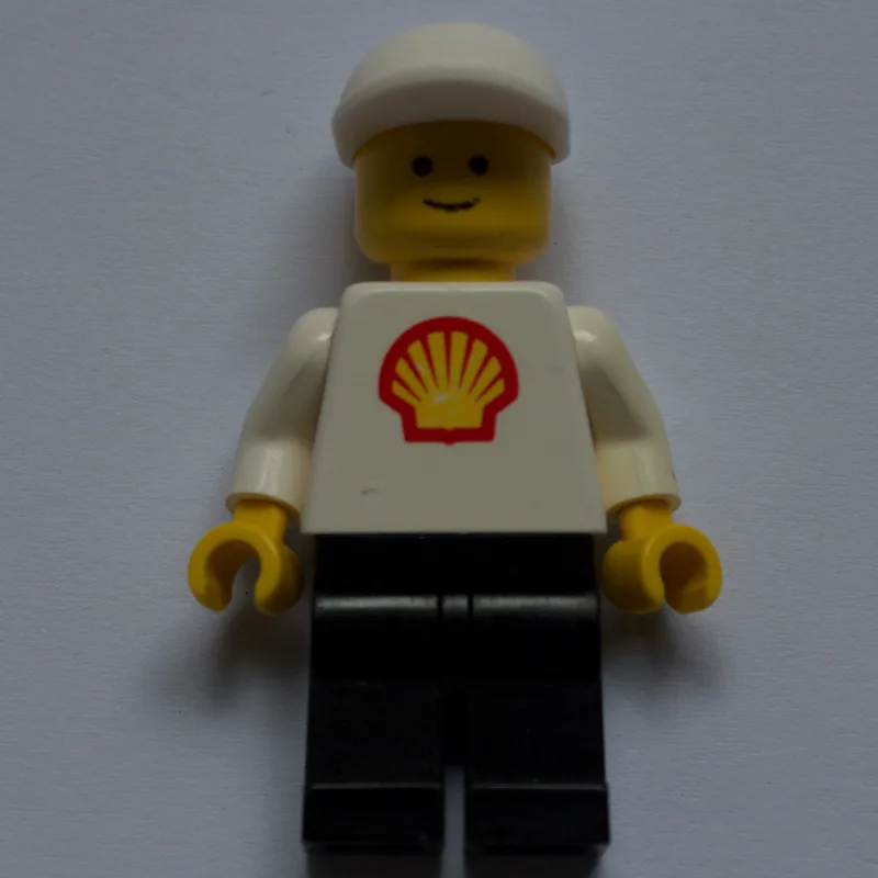 Man, White Torso with Shell Logo, Black Legs,… — minifigurine LEGO | Brick Broker