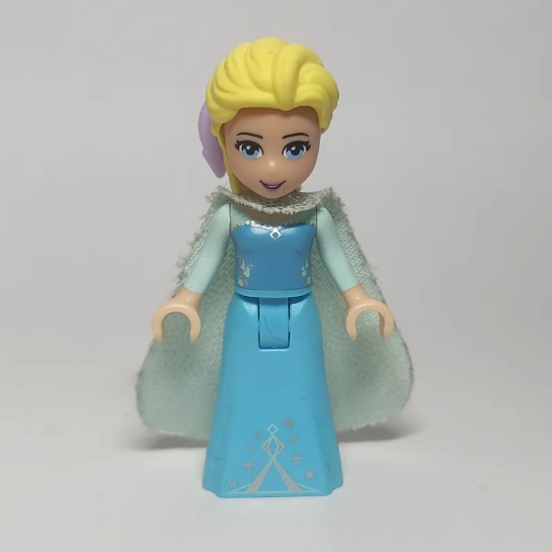 Elsa - Light Aqua Glitter Cape, Bow — dans quels sets LEGO ? (fig-003568) | Brick Broker