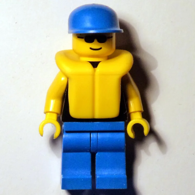 Man, Black Torso, Blue Legs, Blue Cap, Yellow… — minifigurine LEGO | Brick Broker