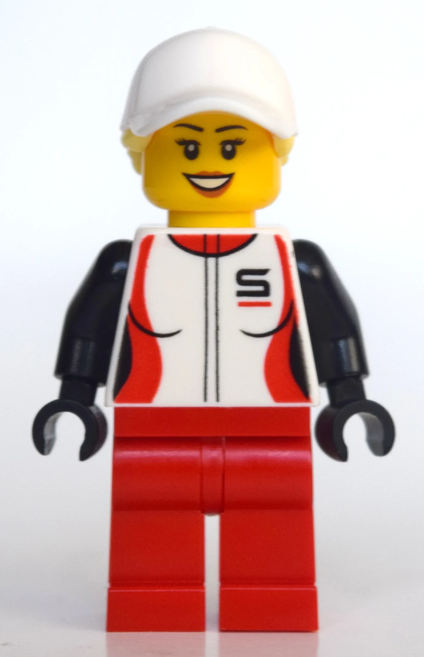 Woman, Racing Jacket, Red Legs, Ponytail with… — minifigurine LEGO | Brick Broker