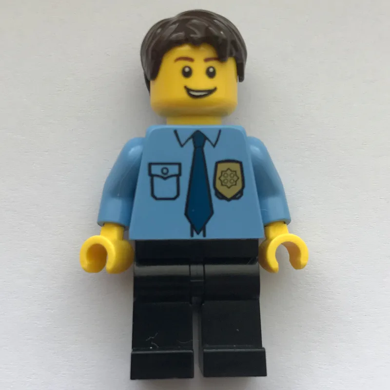 Policeman, Medium Blue Shirt with Badge and T… — minifigurine LEGO | Brick Broker