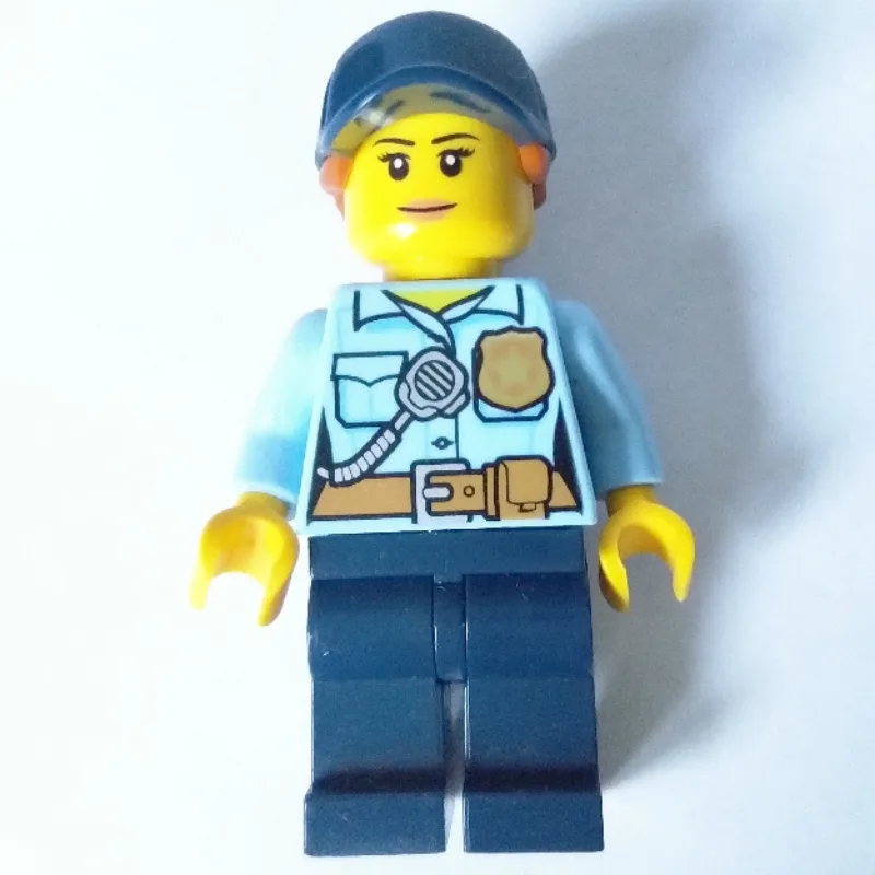 Policewoman, Bright Light Blue Shirt with Rad… — minifigurine LEGO | Brick Broker