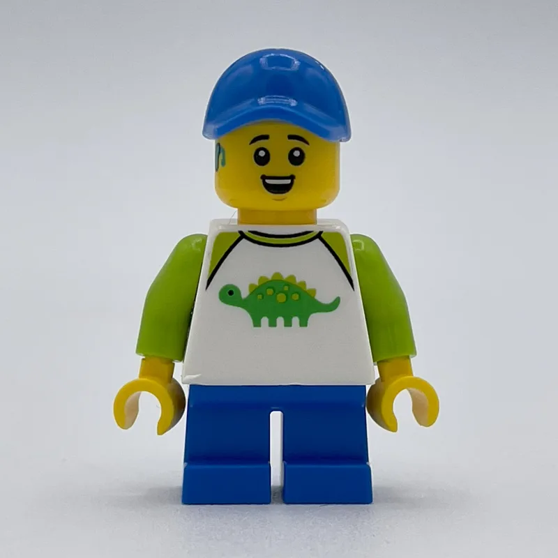 Boy, Dinosaur Shirt, Short Blue Legs, Blue Cap — minifigurine LEGO | Brick Broker