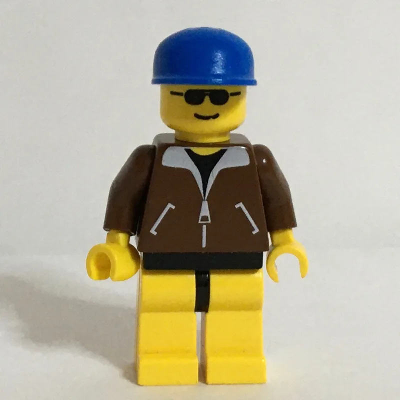 Man - Brown Jacket, Yellow Legs, Blue Cap — minifigurine LEGO | Brick Broker