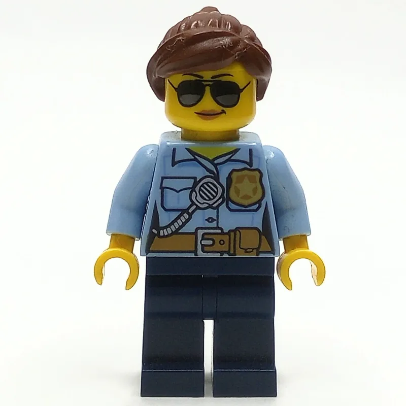 Policewoman, Bright Light Blue Shirt with Rad… — minifigurine LEGO | Brick Broker